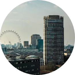 A round image showing the London skyline.